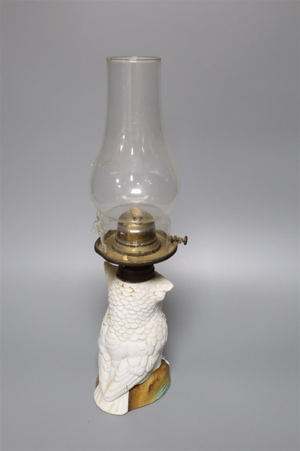 A Possneck porcelain owl novelty oil lamp, total height including chimney 37.5cm